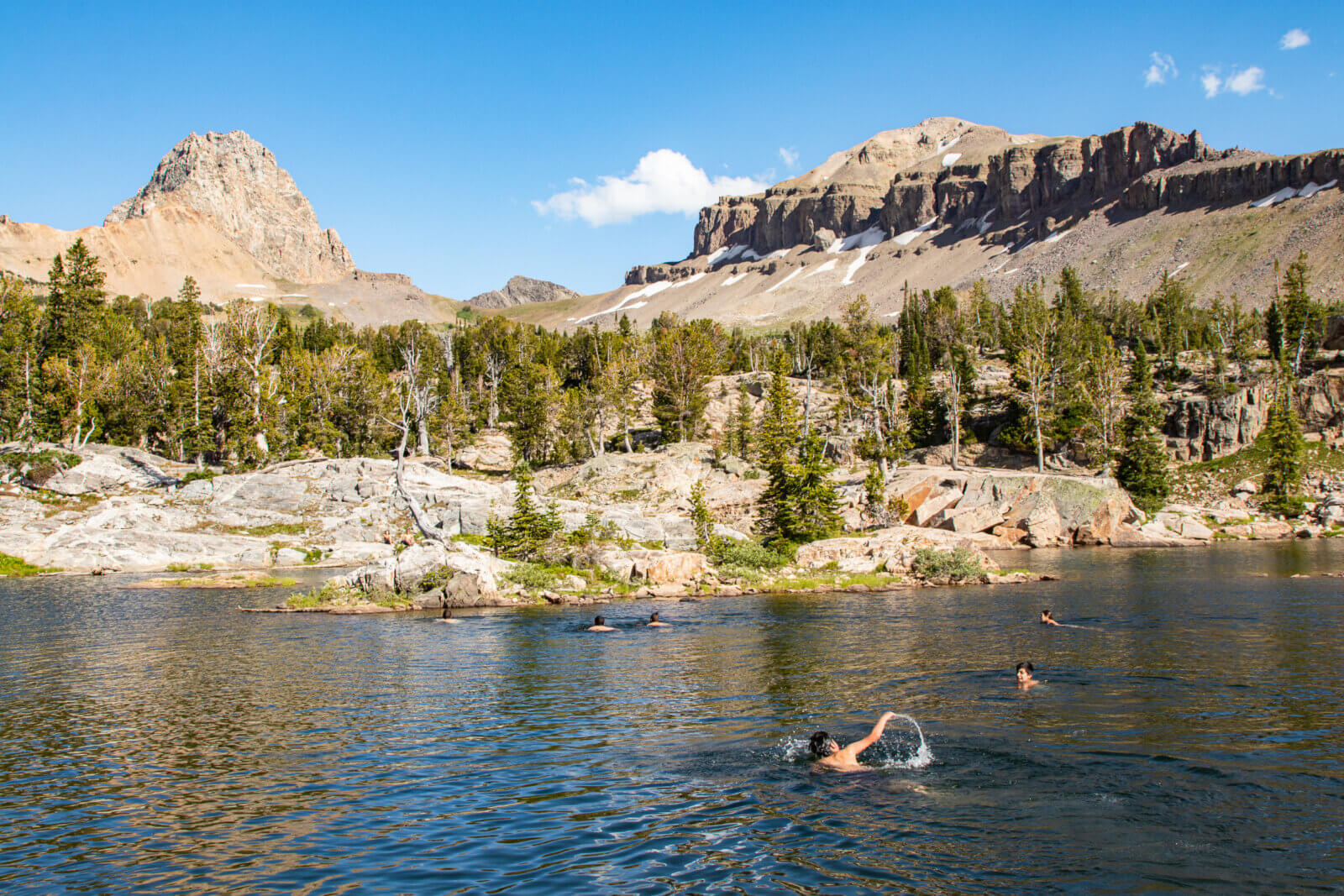Swimming in an alpine lake.